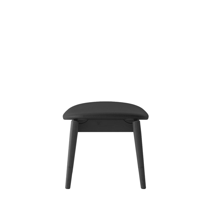 Alta footstool in black and black leather