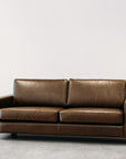 Coco leather sofa in greenstone monarch