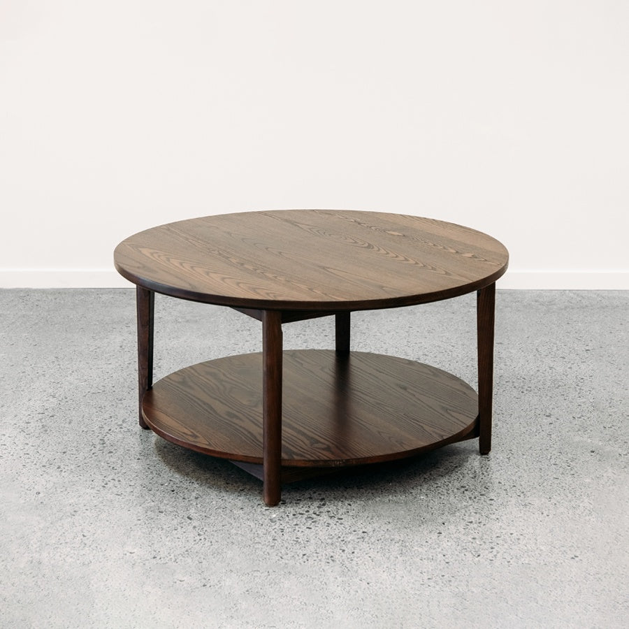 Ghost round coffee table with shelf