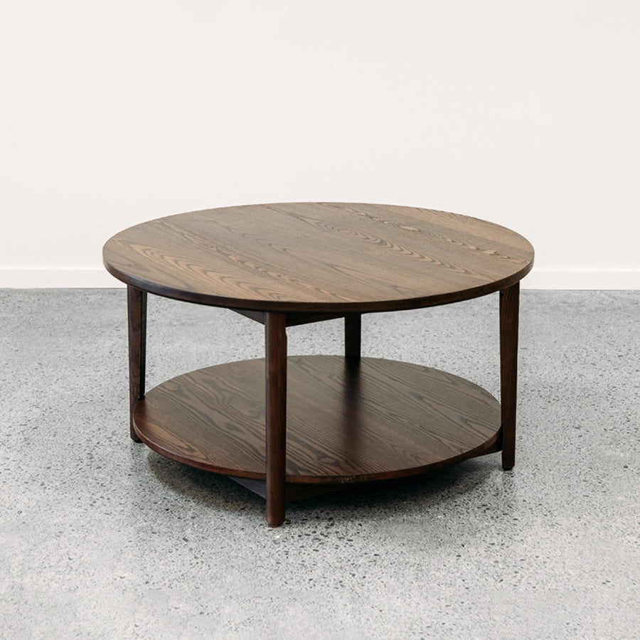 Ghost round coffee table with shelf