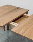 Ghost dining table twin leaf extension in oak