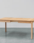 Ghost single leaf extension table