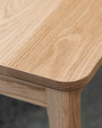 Ghost dining table twin leaf extension in oak
