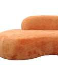 Hendricks curved sofa in Caulfield carrot
