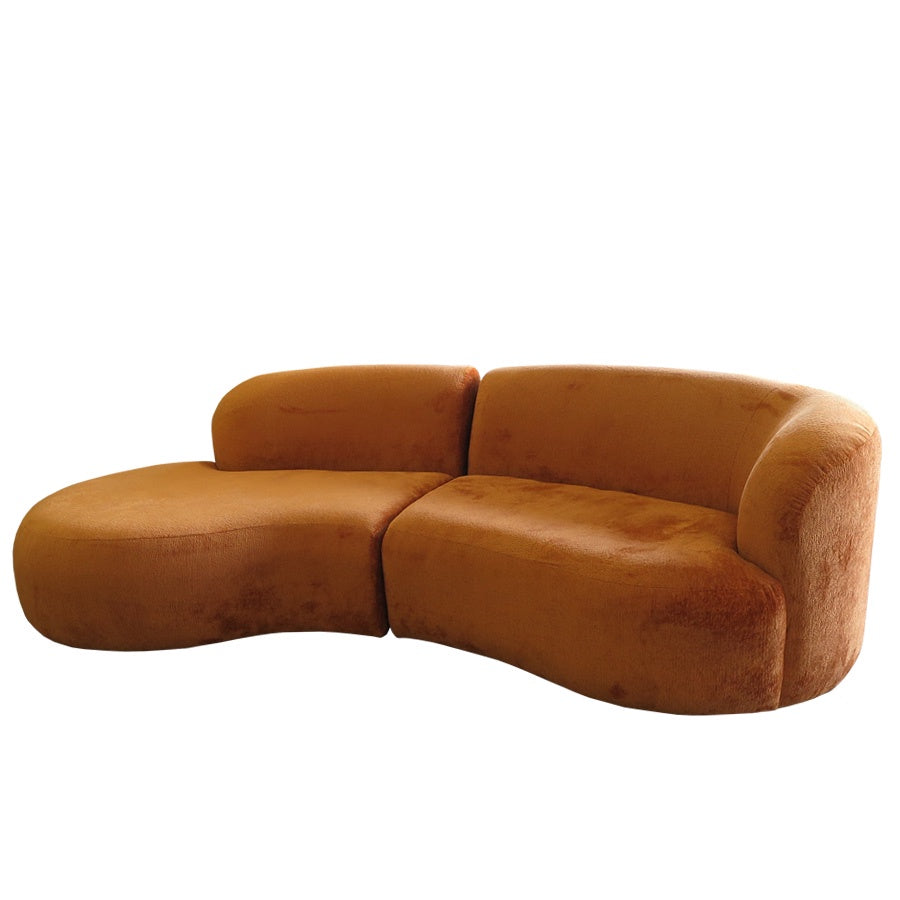 Hendricks curved sofa in Caulfield carrot