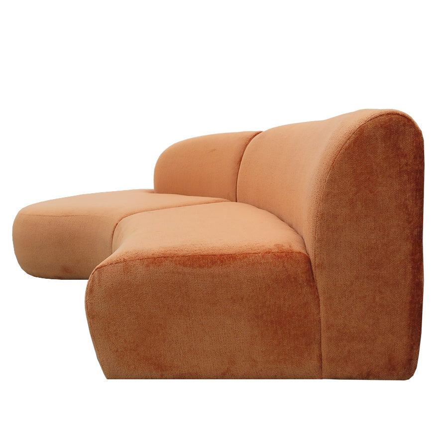 Hendricks curved sofa in Caulfield carrot