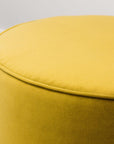 Small round ottoman in plush olive