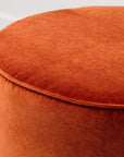 Small round ottoman in theodora paprika