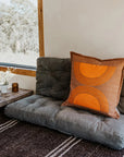 Sundowner cushion in amber brown