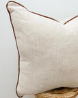Linen cushion with piped edge in natural