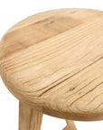 round barstool in natural