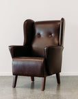 Lily winged leather armchair in settler serge