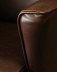 Lily winged leather armchair in settler serge