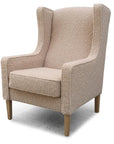 Partridge armchair and footstool in fabio