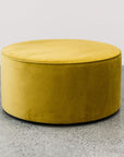 Ghost Large Round Ottoman in plush olive