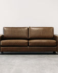 Coco leather sofa in greenstone monarch