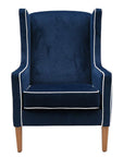 Partridge armchair in plush indigo with contrast piping