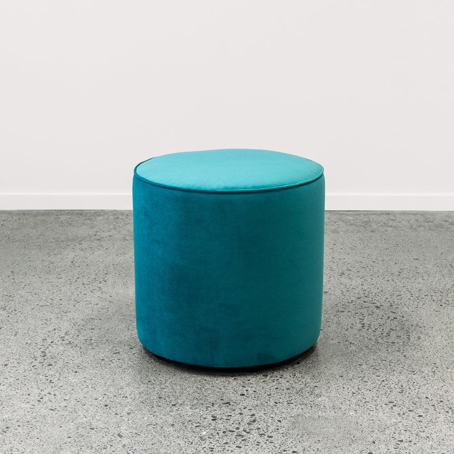 Small round ottoman in novara jungle