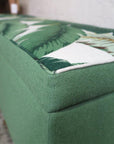 Storage ottoman in tropical palm and nassau forest