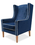 Partridge armchair in plush indigo with contrast piping