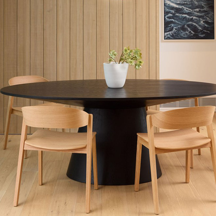Alice oval dining table in black oak