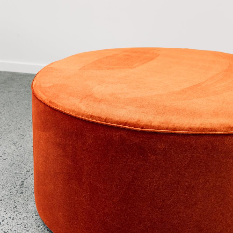 Ghost Large Round Ottoman in theodora paprika