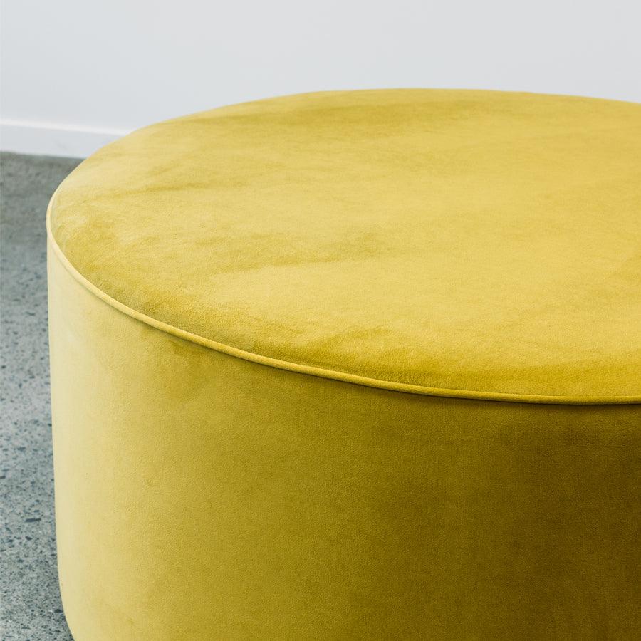 Ghost Large Round Ottoman in plush olive