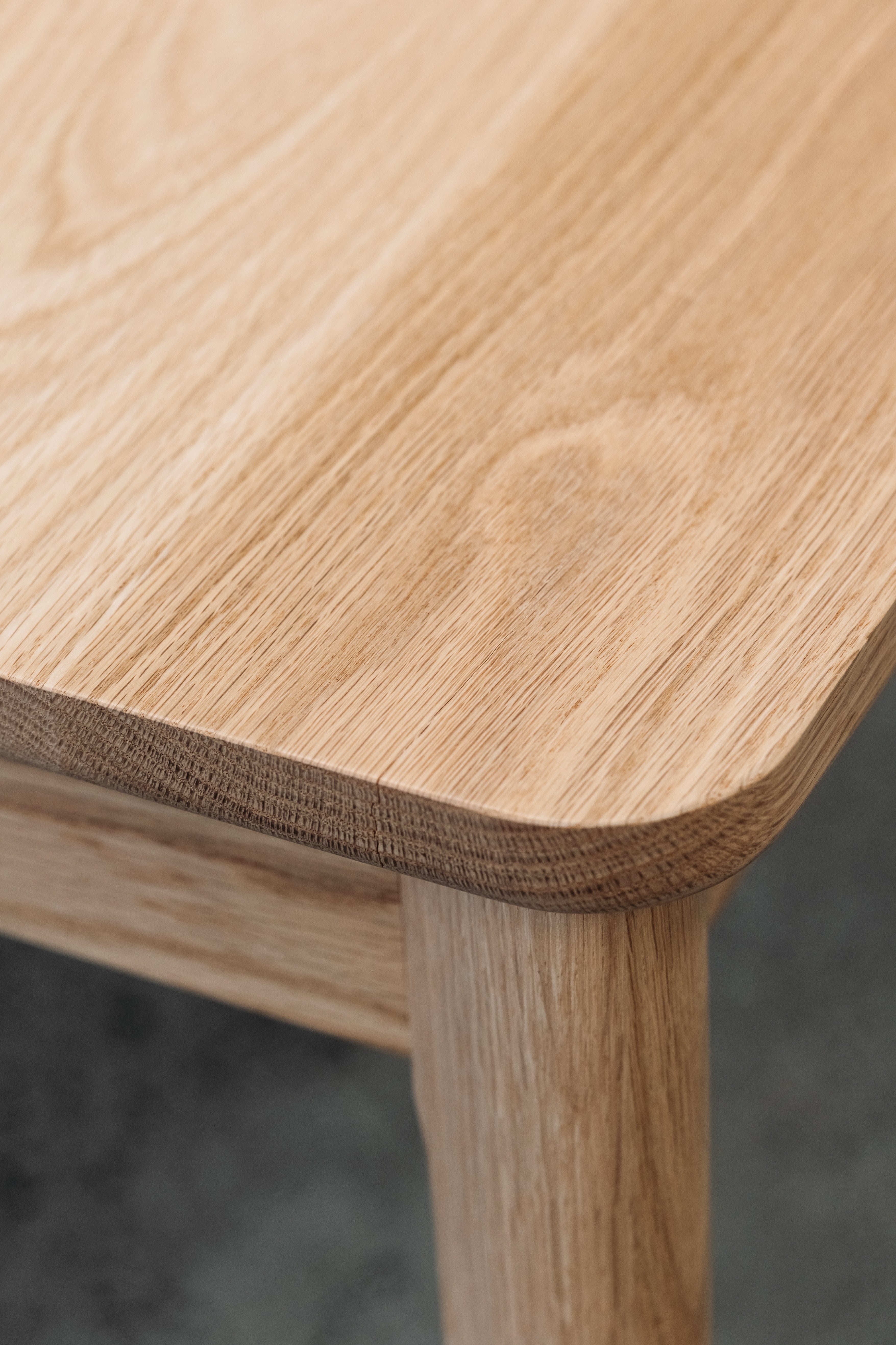 Ghost dining table twin leaf extension in oak