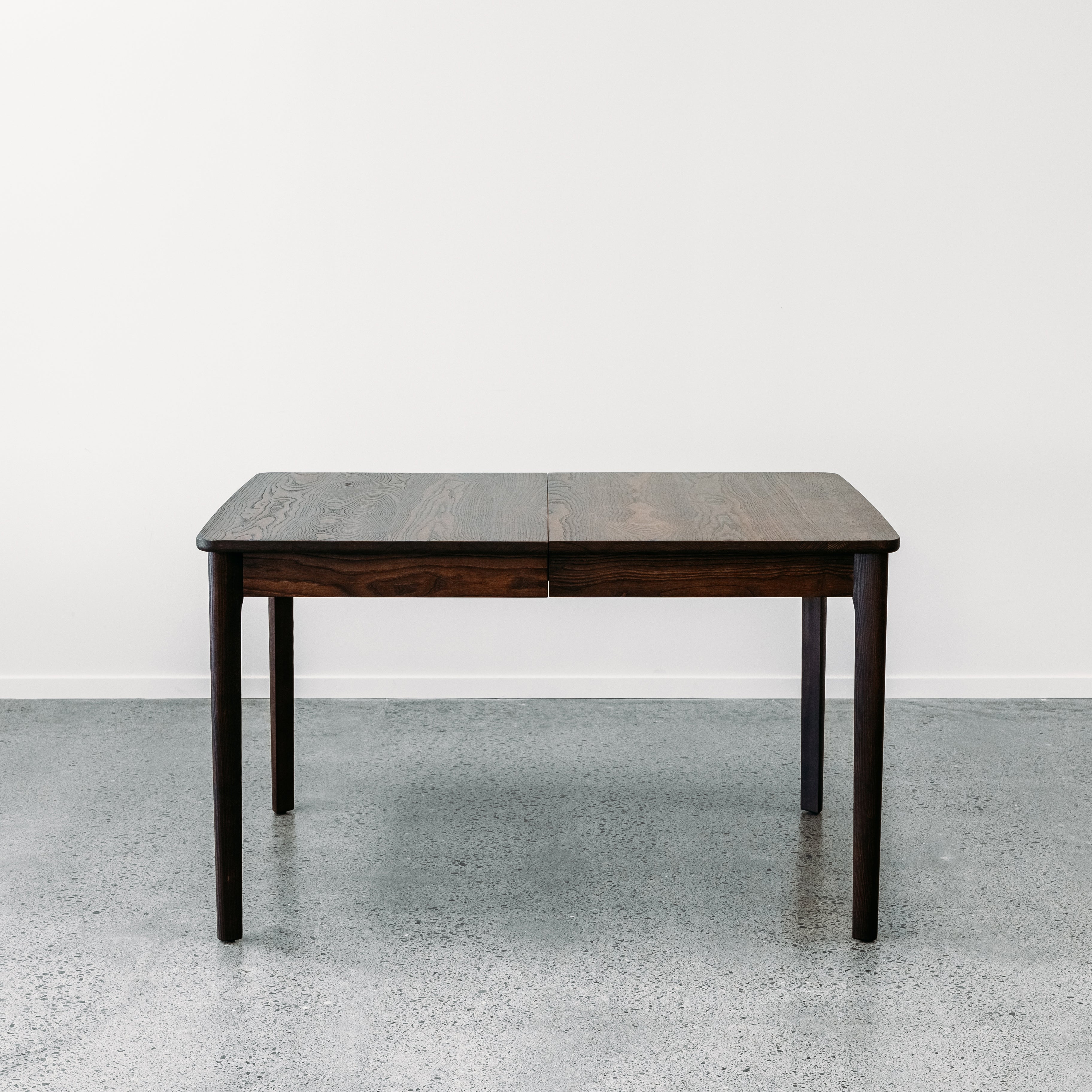 Ghost single leaf extension table