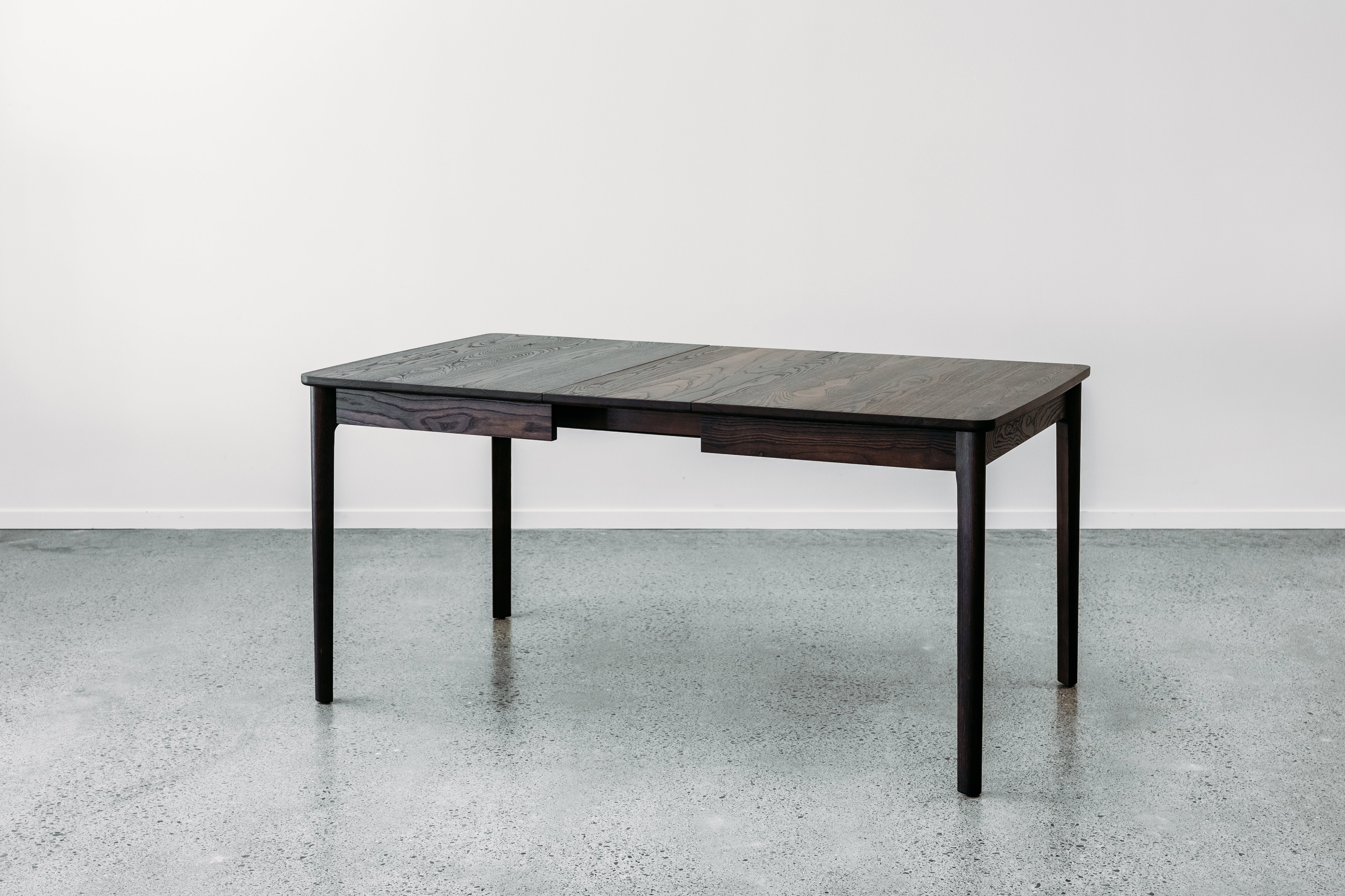 Ghost single leaf extension table