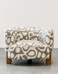 Caleb armchair in atomic stone in a soft geometric pattern
