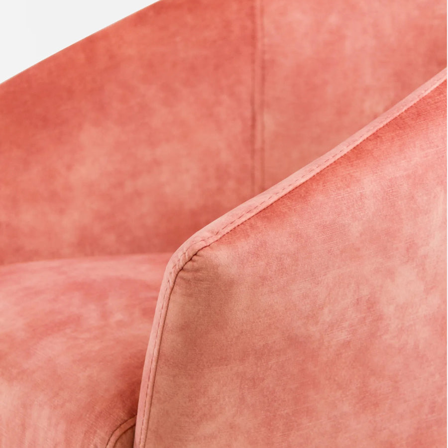 Osteria swivel armchair in baby pink velvet