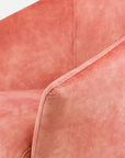 Osteria swivel armchair in baby pink velvet