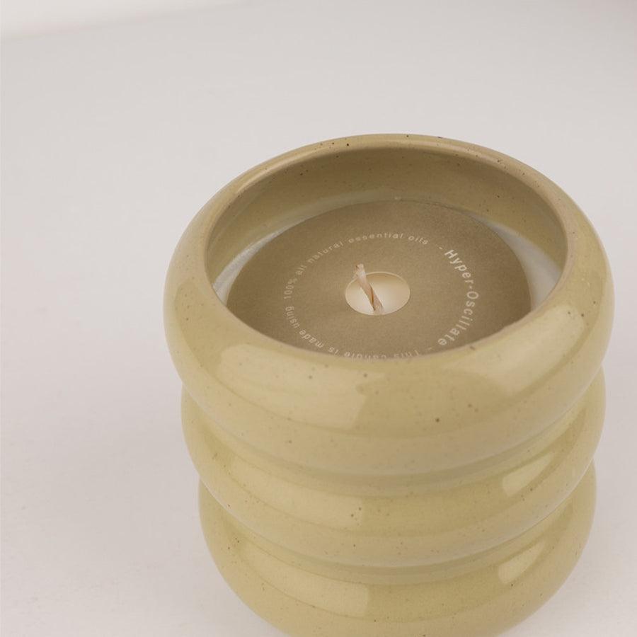 Ceramic candle in scent hyper oscillate