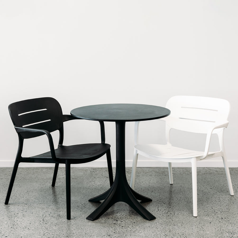 Nova outdoor dining chair in white and black with cafe style table 