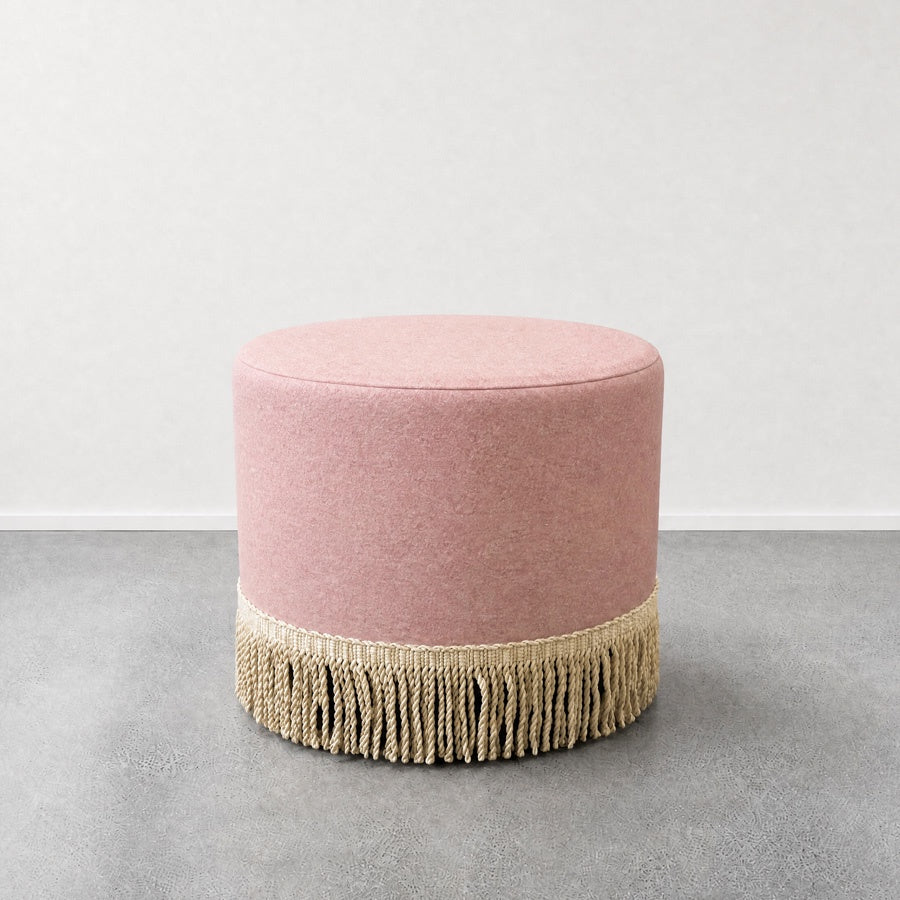 Small round ottoman blush with tassels 
