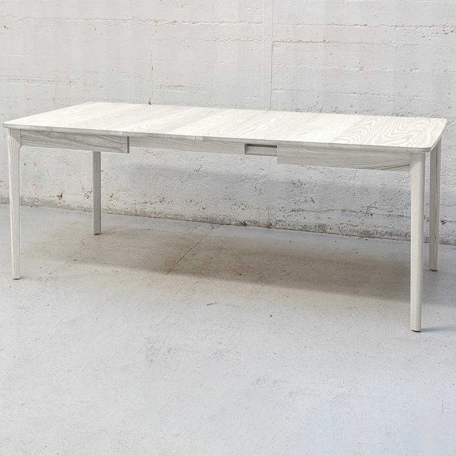 Ghost twin leaf extension table