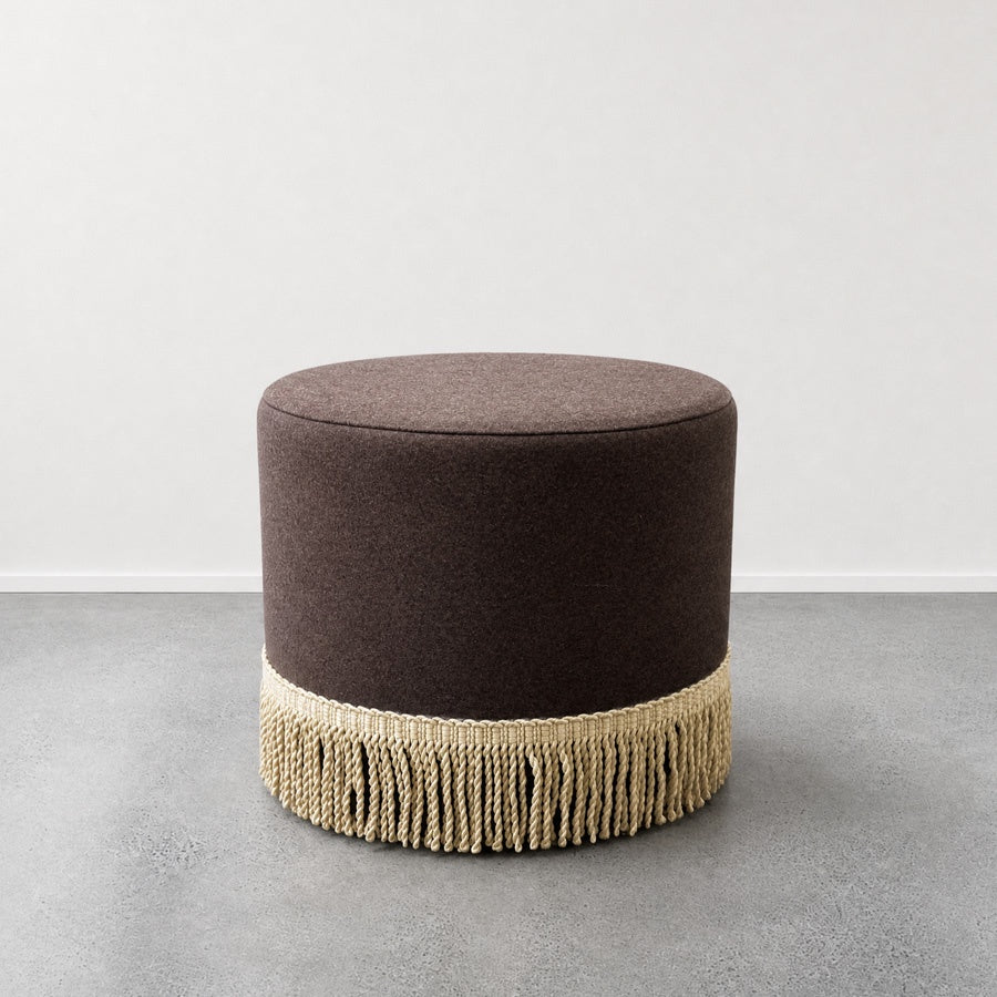 Small round ottoman fudge with tassels 