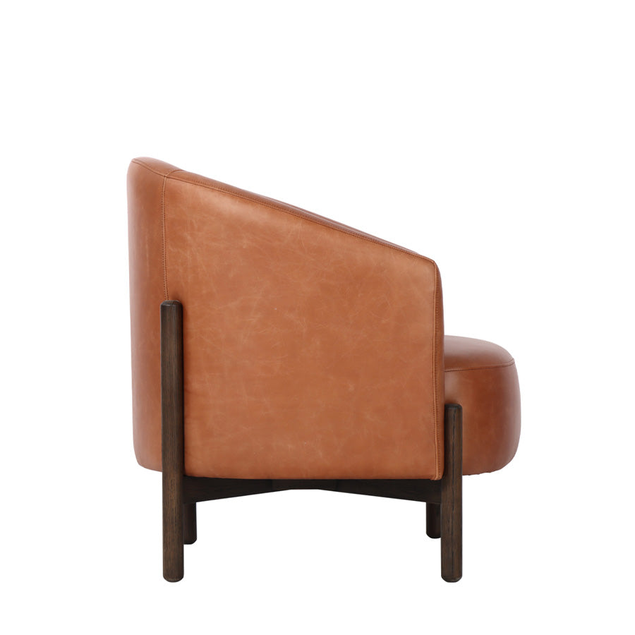 Malibu tub chair in tan leather side