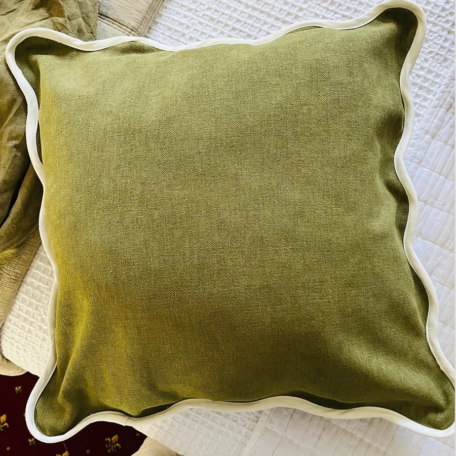 Velveteen scallop edge cushion in olive green