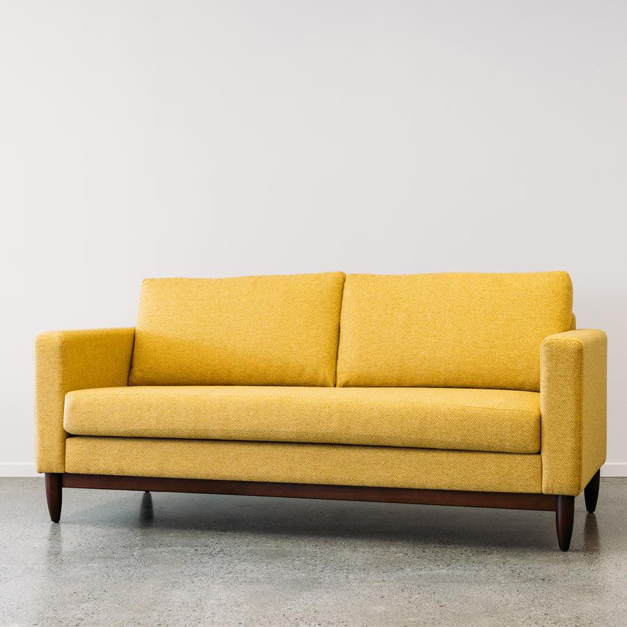 Tango sofa in loft mustard