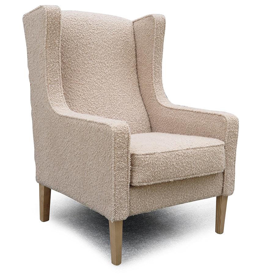 Partridge armchair and footstool in fabio 