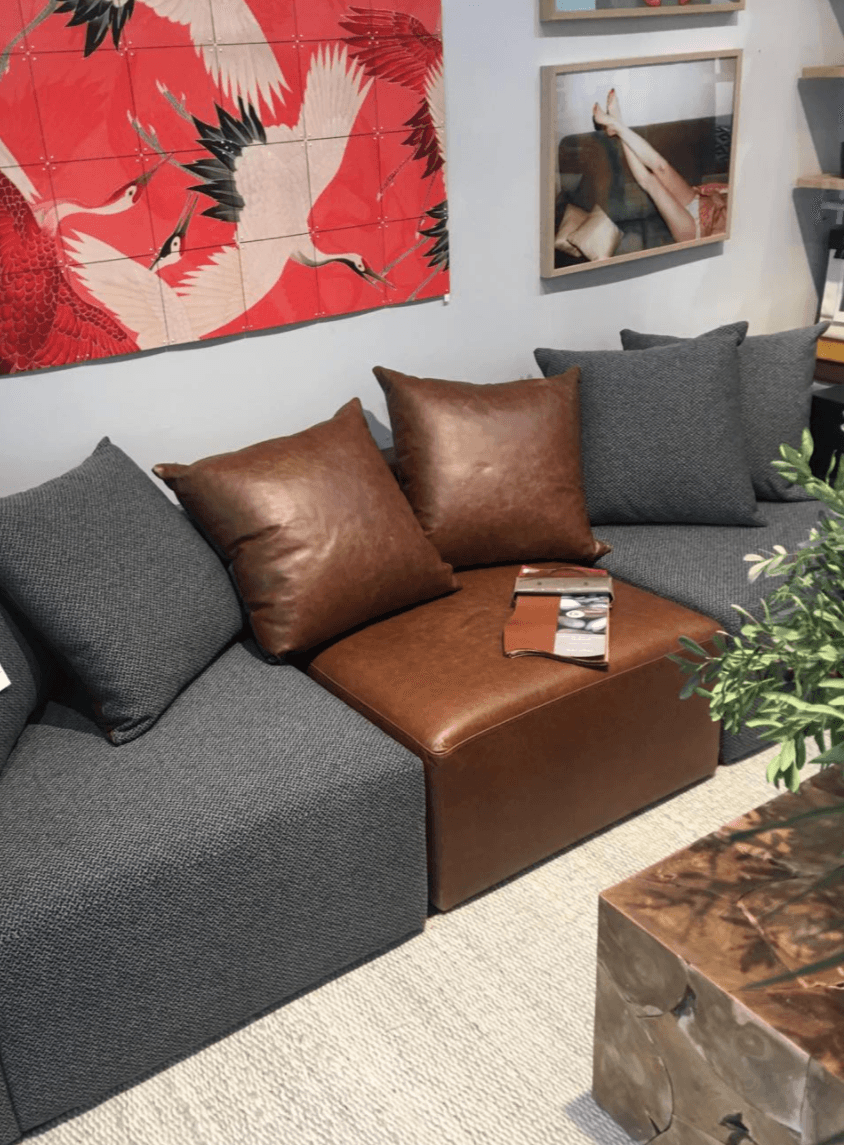 Vito modular sofa in loft charcoal and settler tapa leather