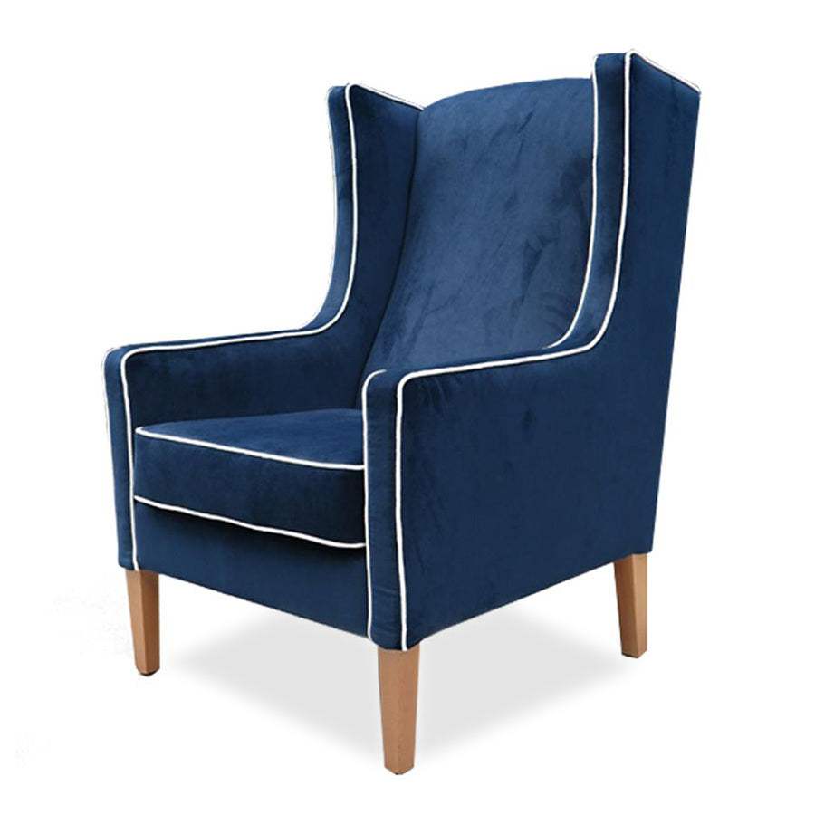 Partridge armchair in plush indigo with contrast piping